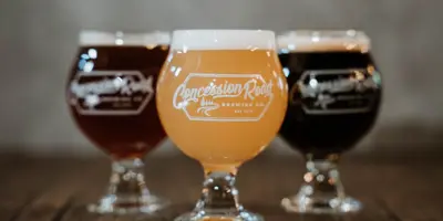 Drinks in Concession Road Brewing-branded glasses