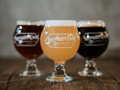 Drinks in Concession Road Brewing-branded glasses