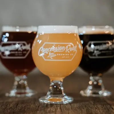 Drinks in Concession Road Brewing-branded glasses