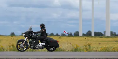 Motorcycling past wind turbines
