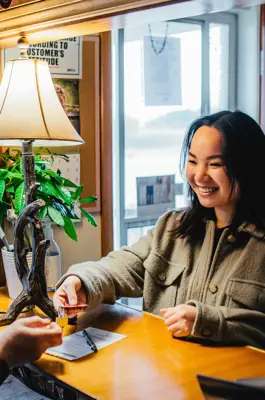 Woman checking out from a BnB
