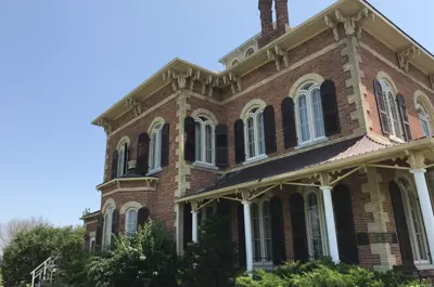 Exterior of the Cottonwood Mansion shot from a low angle