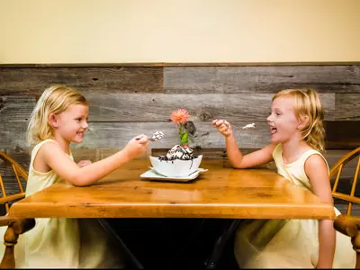 Little Blonde Girls Eating Ice Cream